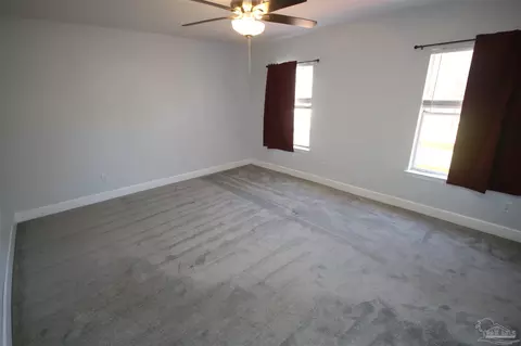 Bedroom - 4308 Floridatown Rd, Pace, FL 32571 photo 4 of 11
