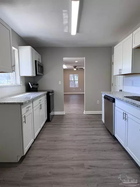 Kitchen - 6426 Walnut St, Milton, FL 32570 photo 3 of 3