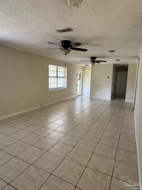 Living - 4400 Mundy Ln, Pace, FL 32571 photo 2 of 4