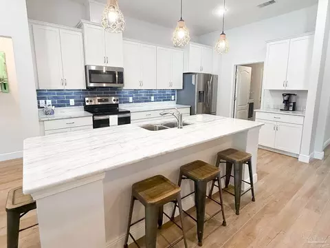 Kitchen - 5527 Dunridge Dr, Pace, FL 32571 photo 3 of 5