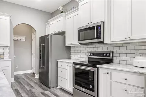 Kitchen - 9258 Roy Cook Rd, Pace, FL 32571 photo 5 of 7
