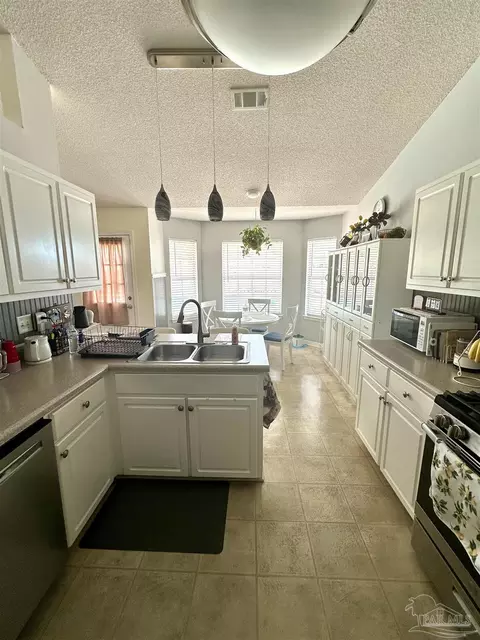 Kitchen - 4806 Oscar Ln, Pace, FL 32571 photo 2 of 4