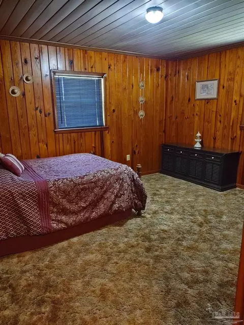 Bedroom - 521 Cox Rd, Mcdavid, FL 32568 photo 2 of 3