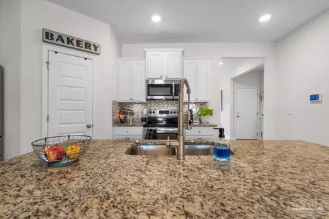 Kitchen - 5324 Red Shoulder Rd, Pace, FL 32571 photo 3 of 4