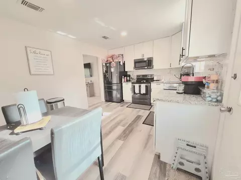 Kitchen - 5441 Gwen Ln, Pace, FL 32571 photo 10 of 11