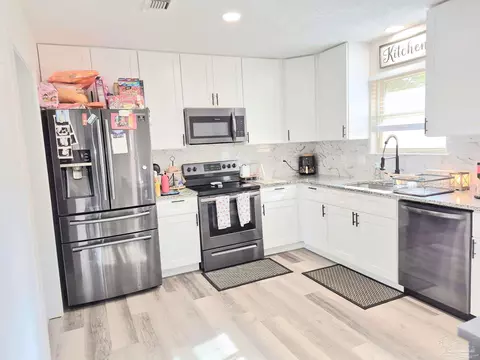Kitchen - 5441 Gwen Ln, Pace, FL 32571 photo 4 of 11