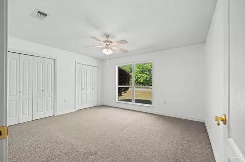Bedroom - 5092 E Spencer Field Rd, Pace, FL 32571 photo 2 of 9
