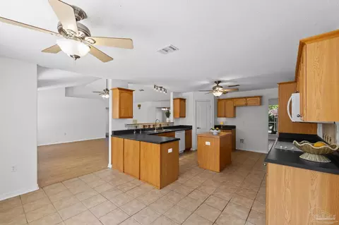 Kitchen - 5092 E Spencer Field Rd, Pace, FL 32571 photo 8 of 8