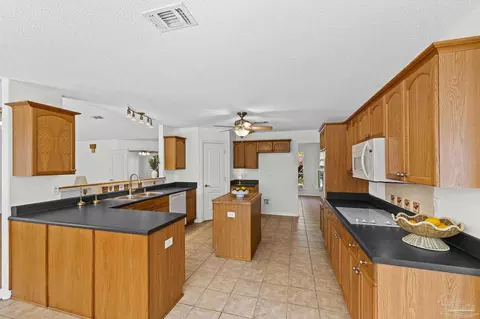 Kitchen - 5092 E Spencer Field Rd, Pace, FL 32571 photo 7 of 8