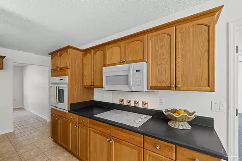 Kitchen - 5092 E Spencer Field Rd, Pace, FL 32571 photo 4 of 8
