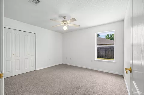 Bedroom - 5092 E Spencer Field Rd, Pace, FL 32571 photo 4 of 9