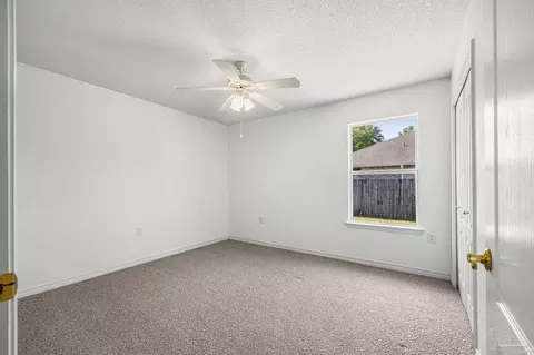 Bedroom - 5092 E Spencer Field Rd, Pace, FL 32571 photo 6 of 9
