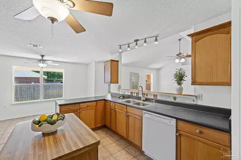 Kitchen - 5092 E Spencer Field Rd, Pace, FL 32571 photo 5 of 8