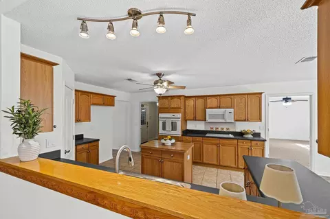 Kitchen - 5092 E Spencer Field Rd, Pace, FL 32571 photo 1 of 8