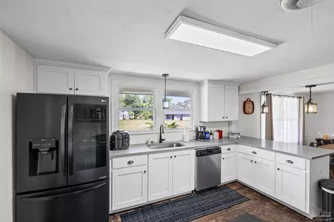 Kitchen - 1985 Tate Rd, Cantonment, FL 32533 photo 9 of 9
