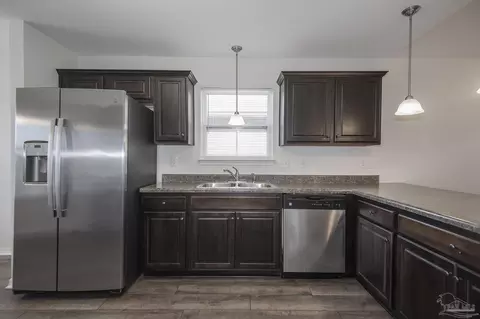 Kitchen - 3954 Willow Glen Dr, Pace, FL 32571 photo 2 of 3