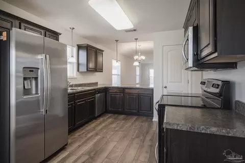 Kitchen - 3954 Willow Glen Dr, Pace, FL 32571 photo 3 of 3
