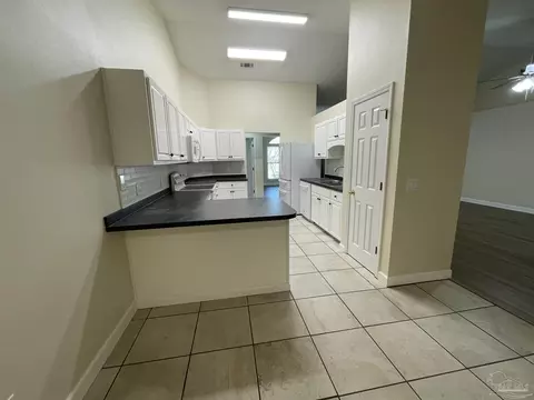 Kitchen - 11739 Old Course Rd, Cantonment, FL 32533 photo 2 of 3