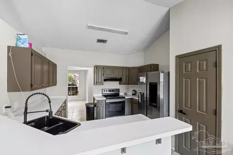 Kitchen - 1763 Condor Dr, Cantonment, FL 32533 photo 2 of 3