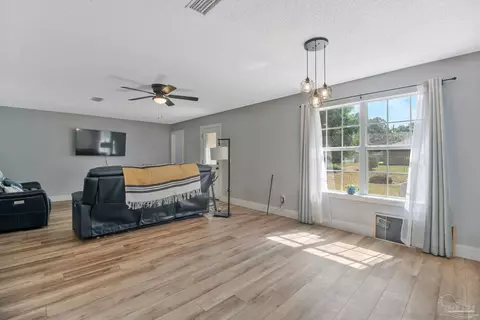 Living - 3972 Floridatown Rd, Pace, FL 32571 photo 2 of 2