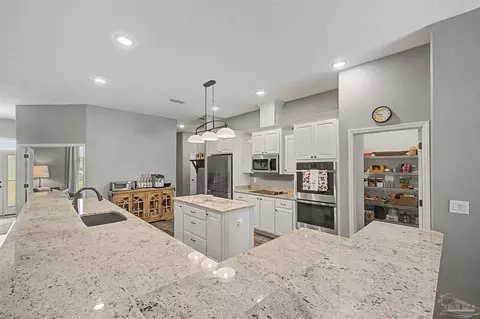 Kitchen - 5596 Micanopy Dr, Milton, FL 32570 photo 5 of 11