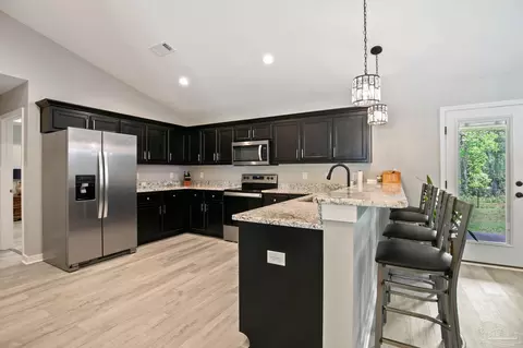 Kitchen - 4942 Guernsey Rd, Pace, FL 32571 photo 1 of 3