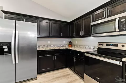 Kitchen - 4942 Guernsey Rd, Pace, FL 32571 photo 3 of 3