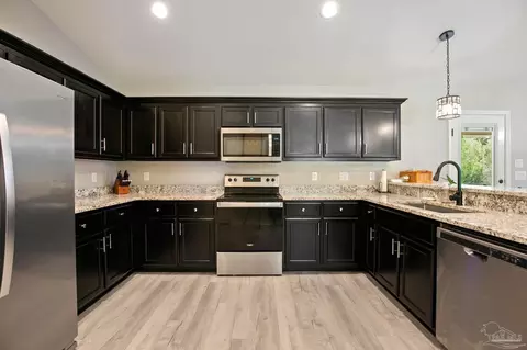 Kitchen - 4942 Guernsey Rd, Pace, FL 32571 photo 2 of 3
