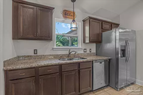 Kitchen - 5673 Flume Dr, Pace, FL 32571 photo 3 of 4