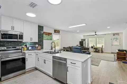 Kitchen - 4701 Eagles Ridge Rd, Pace, FL 32571 photo 3 of 3