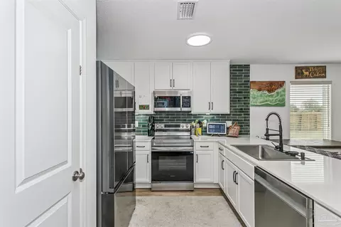 Kitchen - 4701 Eagles Ridge Rd, Pace, FL 32571 photo 2 of 3