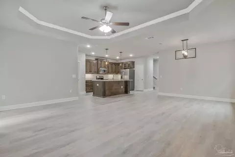 Living - 5402 Parkside Dr, Pace, FL 32571 photo 4 of 6