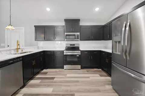 Kitchen - 4986 Guernsey Rd, Pace, FL 32571 photo 2 of 4
