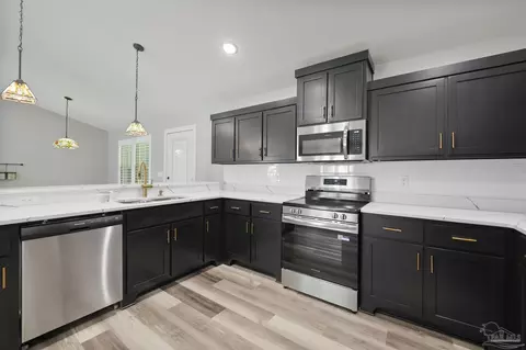 Kitchen - 4986 Guernsey Rd, Pace, FL 32571 photo 3 of 4