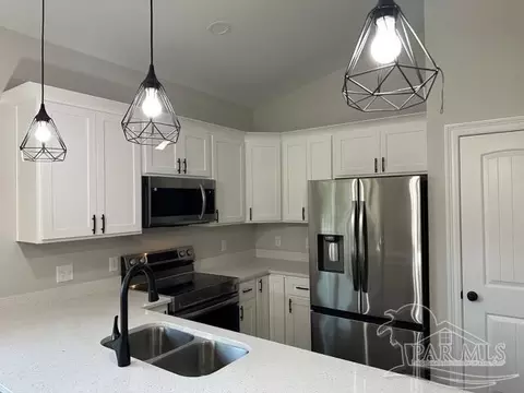 Kitchen - 3300 Bonfire Dr, Milton, FL 32583 photo 1 of 9