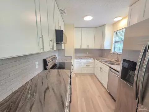 Kitchen - 215 Aza Pl, Crestview, FL 32539 photo 6 of 6