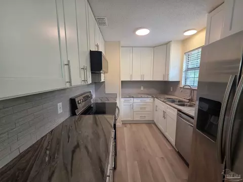 Kitchen - 215 Aza Pl, Crestview, FL 32539 photo 5 of 6