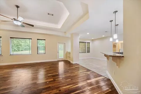 Living - 3442 Smyer Dr, Pace, FL 32571 photo 6 of 9