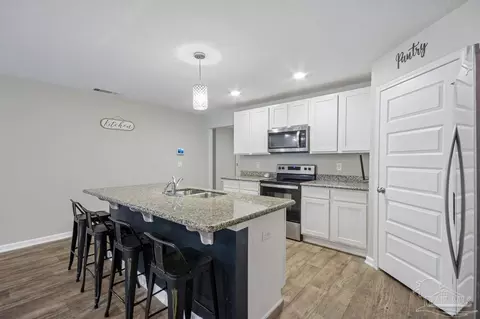 Kitchen - 4656 Red Oak Dr, Milton, FL 32583 photo 2 of 2