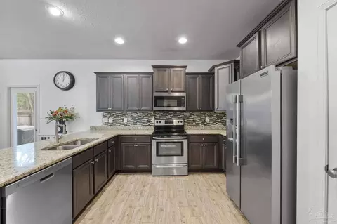 Kitchen - 3634 Hawks Landing Cir, Pace, FL 32571 photo 2 of 4