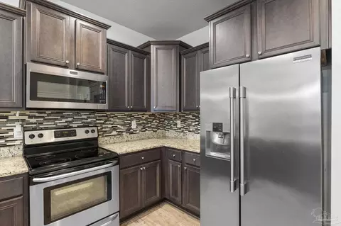 Kitchen - 3634 Hawks Landing Cir, Pace, FL 32571 photo 4 of 4