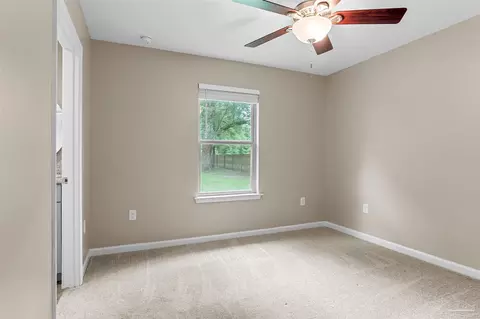 Bedroom - 3177 Wallace Lake Rd, Pace, FL 32571 photo 6 of 9
