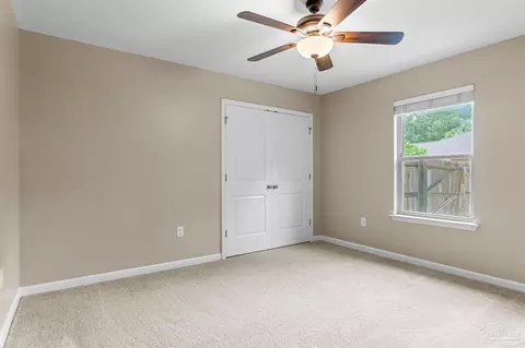 Bedroom - 3177 Wallace Lake Rd, Pace, FL 32571 photo 4 of 9