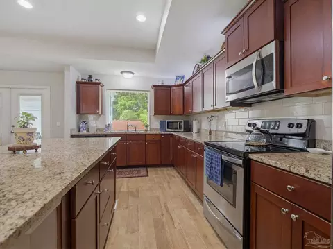 Kitchen - 6097 Autumn Pines Cir, Pace, FL 32571 photo 4 of 8
