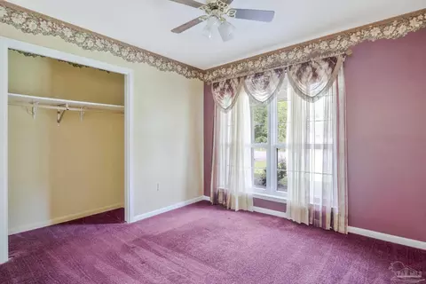Bedroom - 4411 Pace Ln, Pace, FL 32571 photo 2 of 10