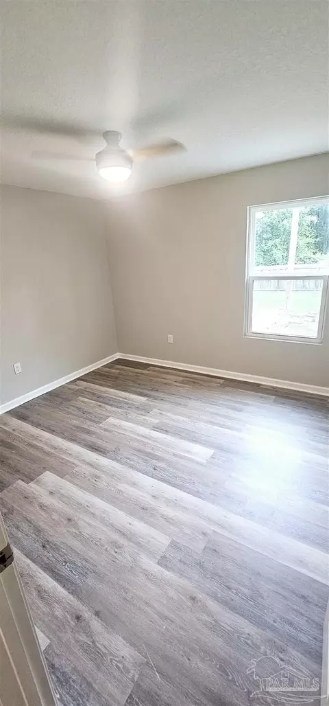 Bedroom - 6594 Firefly Dr, Milton, FL 32583 photo 3 of 4