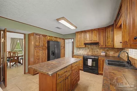 Kitchen - 10219 Edendale Ln, Cantonment, FL 32533 photo 2 of 7