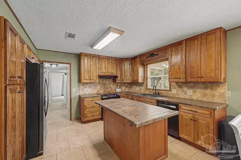 Kitchen - 10219 Edendale Ln, Cantonment, FL 32533 photo 4 of 7