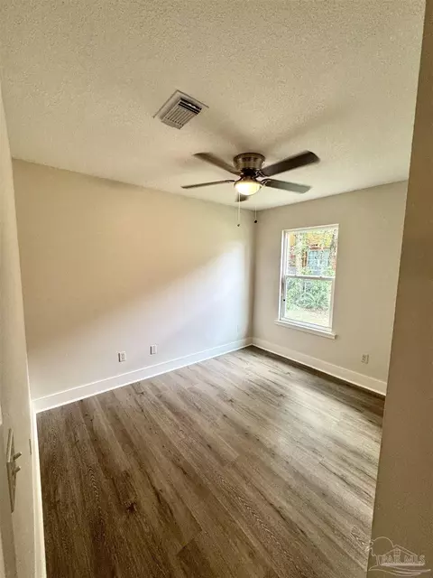 Bedroom - 424 Front St, Century, FL 32535 photo 3 of 11