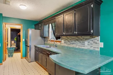 Kitchen - 6280 Mohawk Trl, Milton, FL 32583 photo 1 of 2